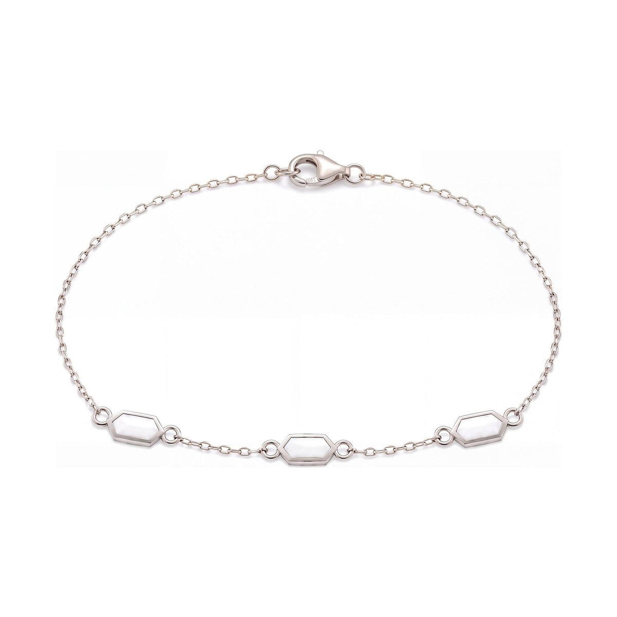 14K white gold enamel bracelet, three white enamel hexagon stations on a fine cable chain, on white