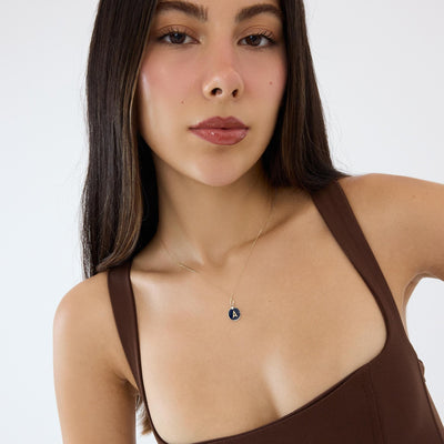 14K gold enamel initial necklace, styled view