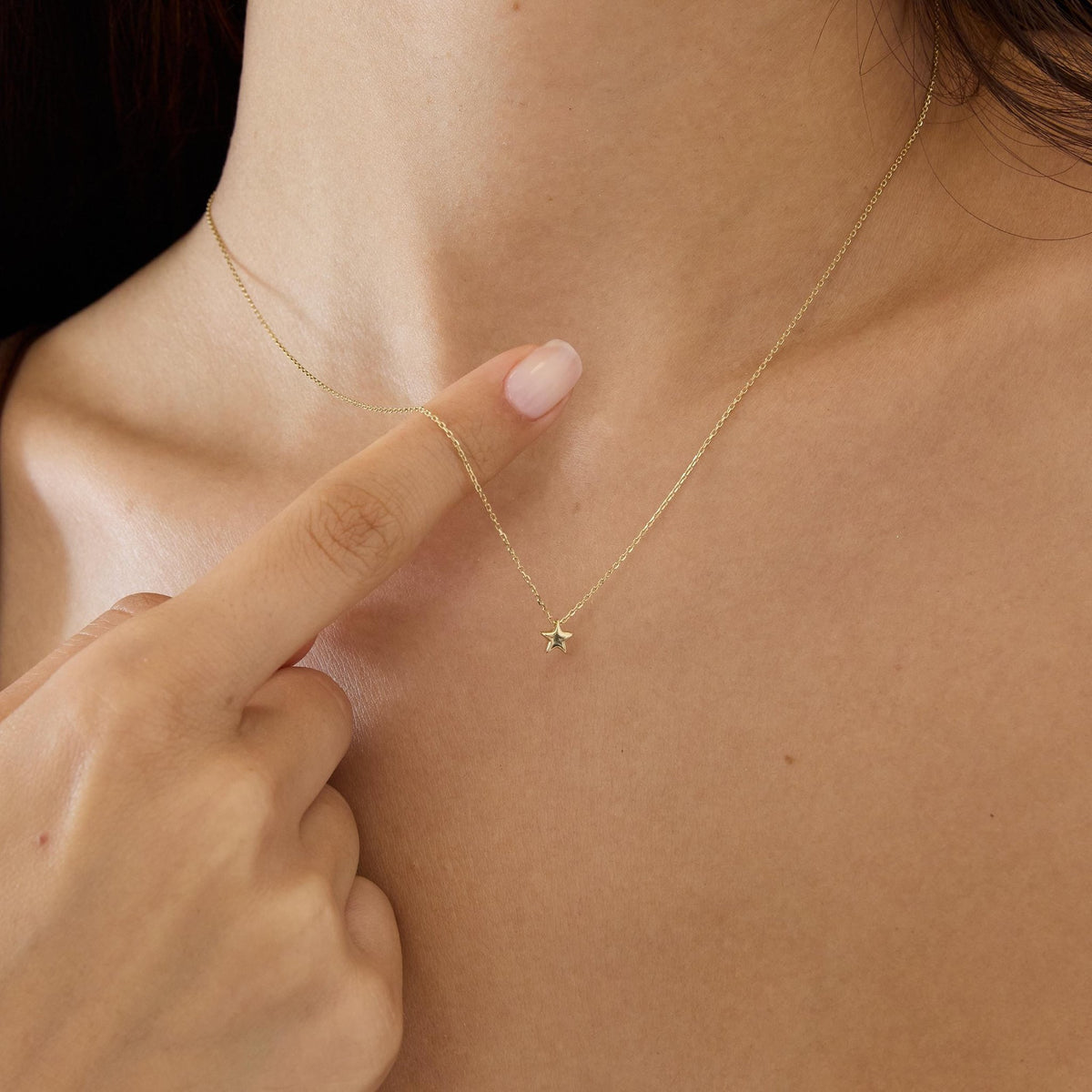 14K gold five point star pendant necklace, styled view