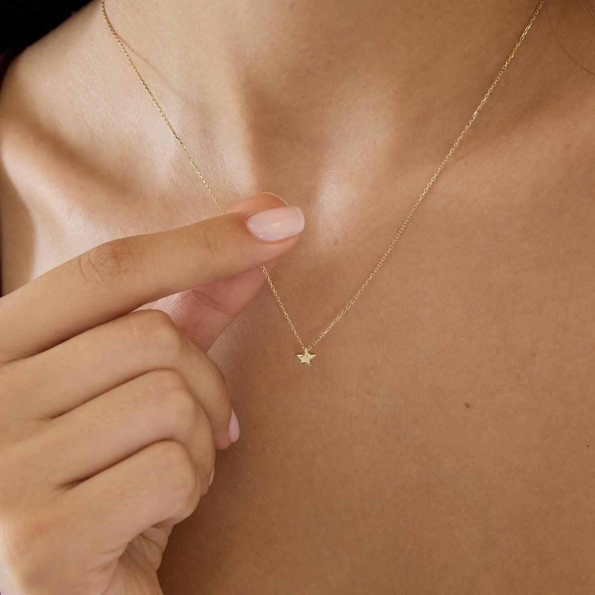 14K gold five point star pendant necklace, styled view