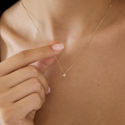 14K gold five point star pendant necklace, styled view