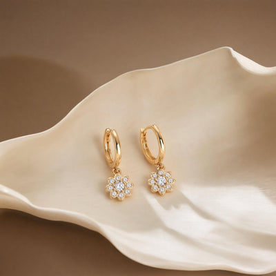 14K gold floral huggies earrings, styled view