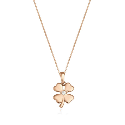 14K gold four-leaf clover pendant necklace with central cubic zirconia on fine gold chain