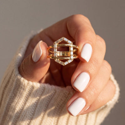 14K gold geometric baguette cz criss cross ring, styled view