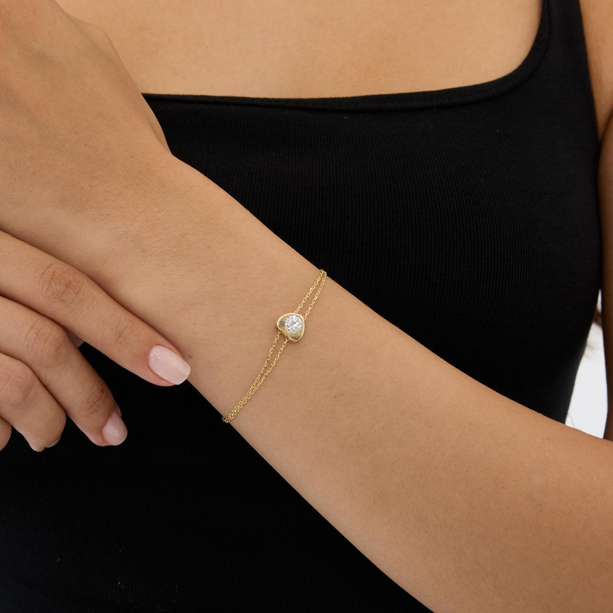 14K gold heart bracelet, styled view