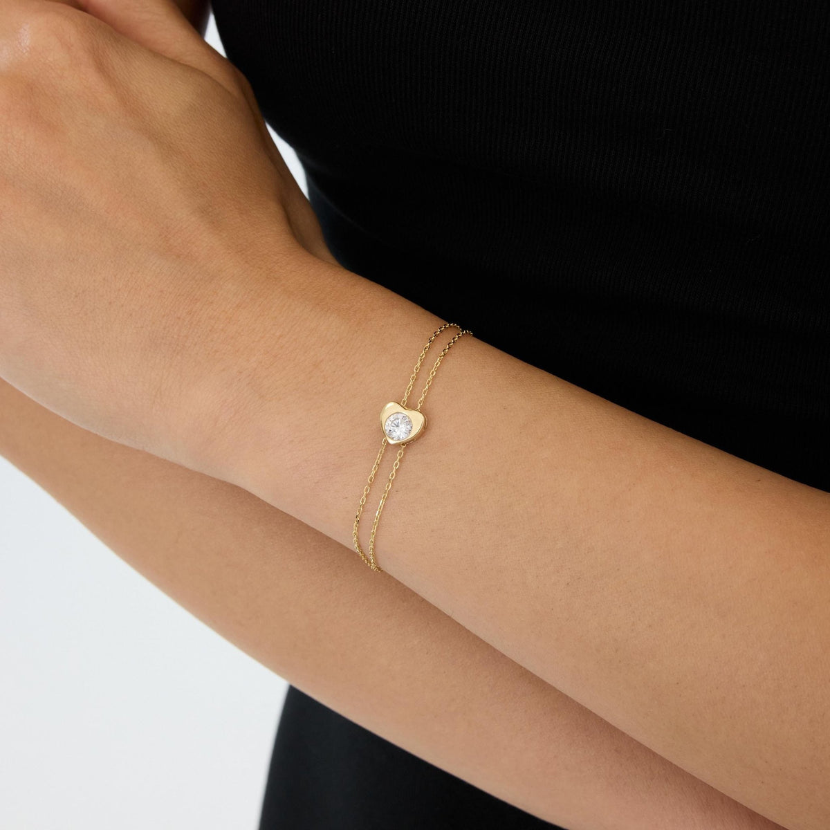 14K gold heart bracelet, styled view