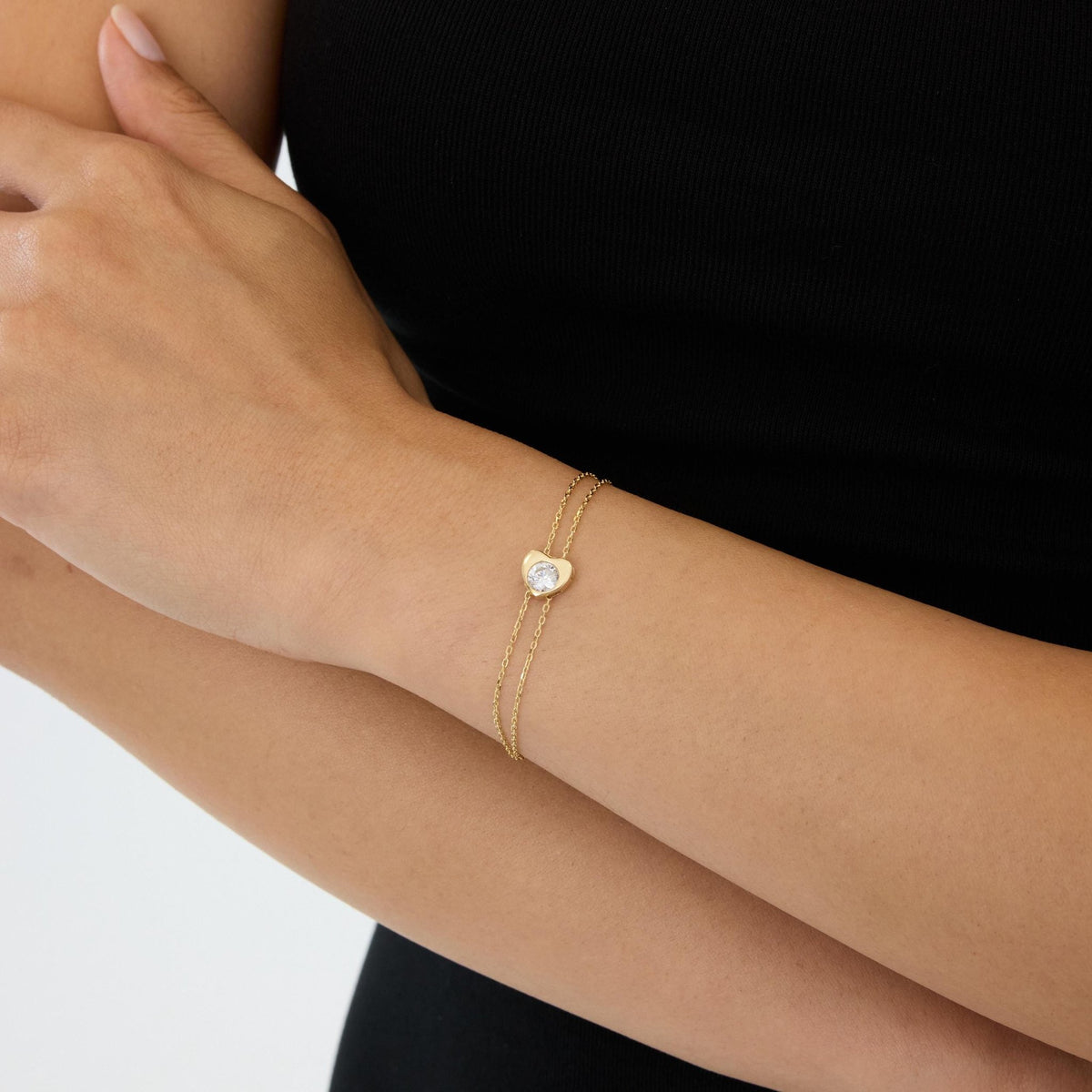 14K gold heart bracelet, styled view