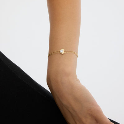 14K gold heart bracelet, styled view