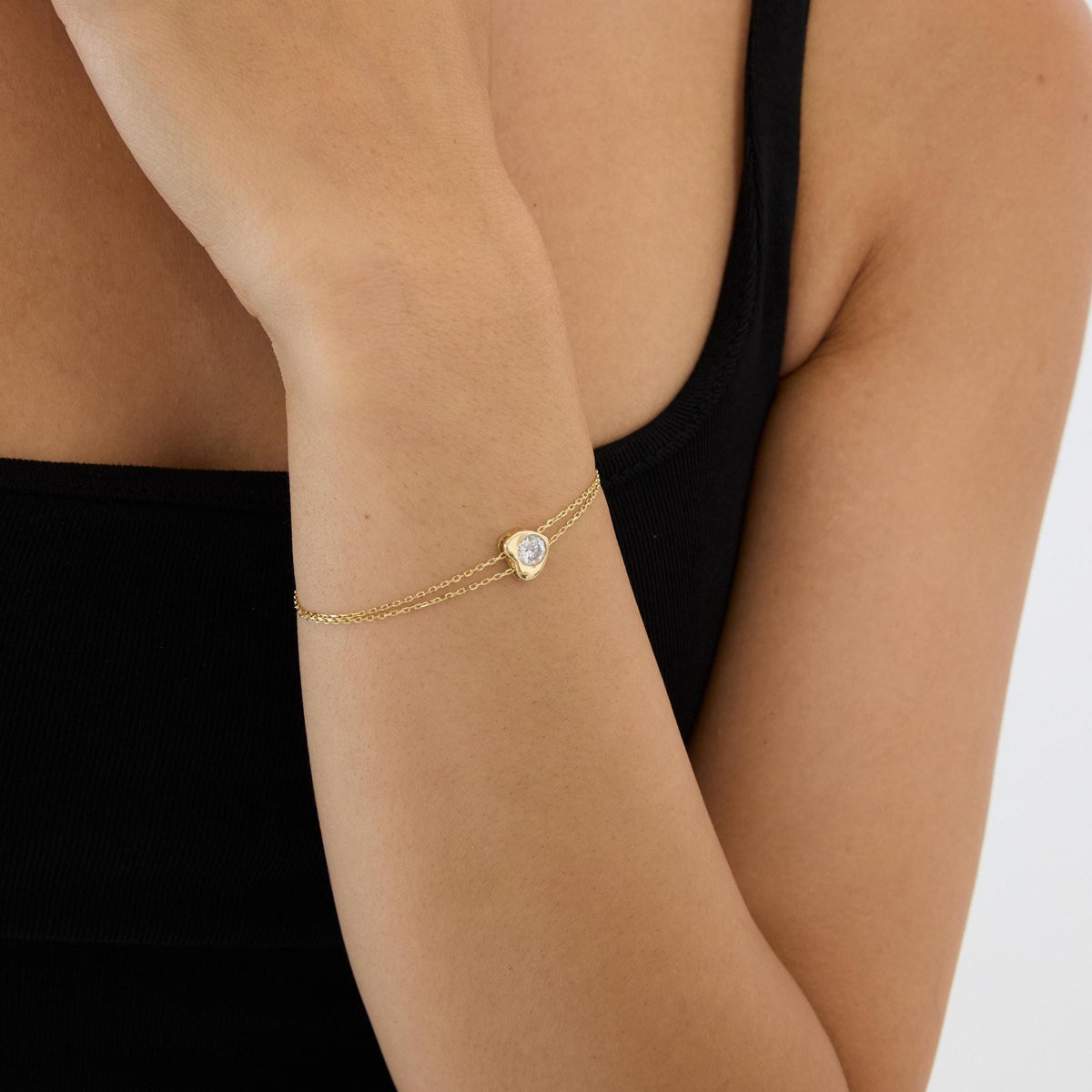 14K gold heart bracelet, styled view