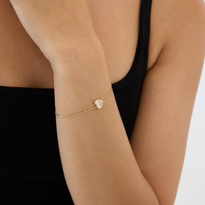 14K gold heart bracelet, styled view