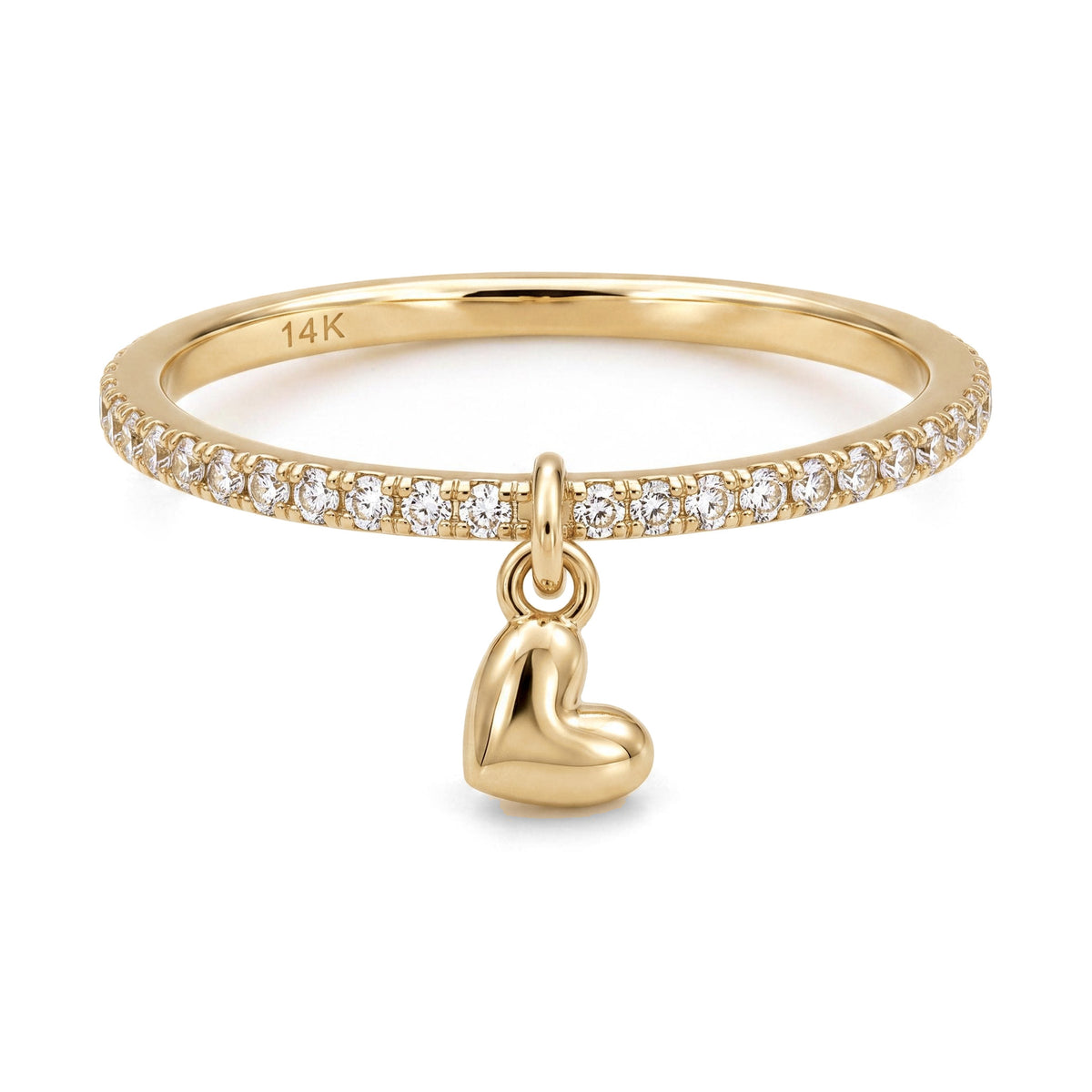 14K yellow gold heart charm ring, clear stone band with a dangling puffed heart, front view on white