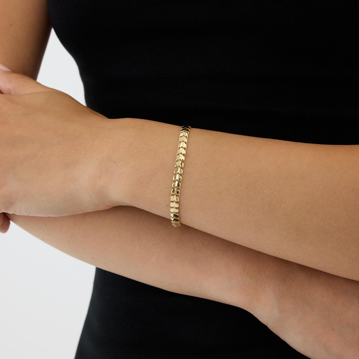 14K gold heart link bracelet, styled view
