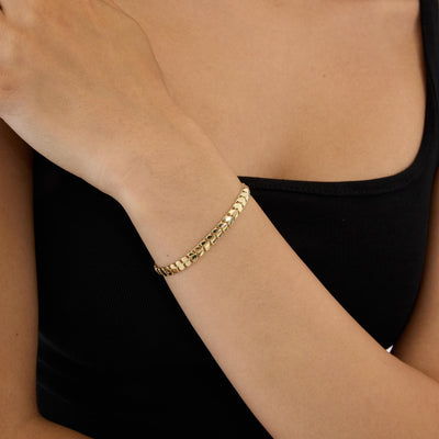 14K gold heart link bracelet, styled view
