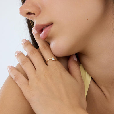 14K gold heart-shaped ring, styled view