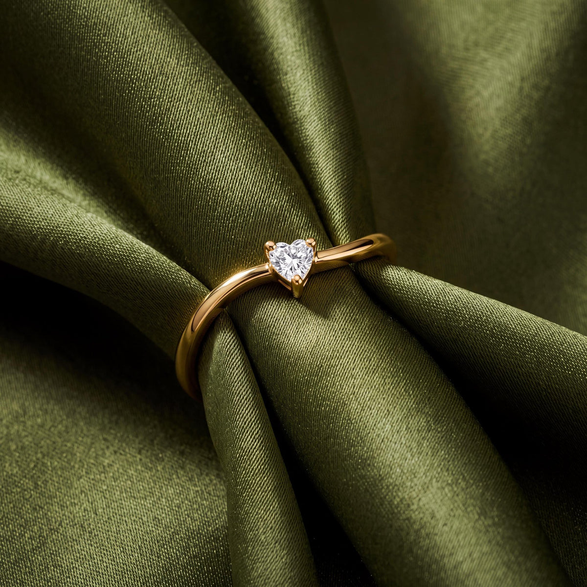 14K gold heart-shaped ring, styled view