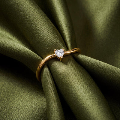 14K gold heart-shaped ring, styled view
