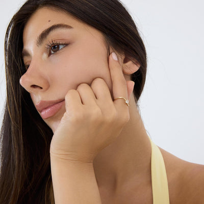 14K gold heart-shaped ring, styled view