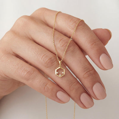 14K gold hexagon zirconia necklace, styled view