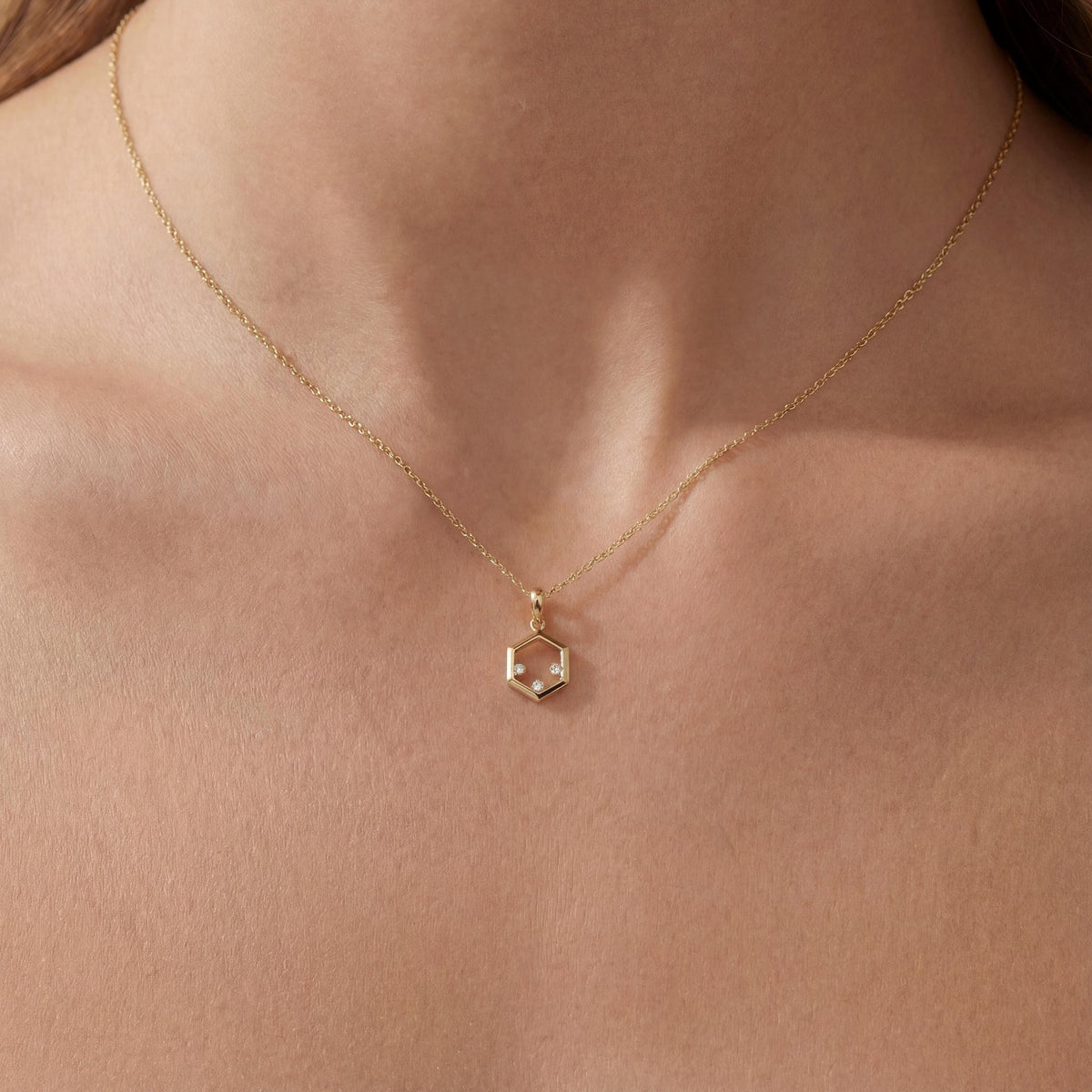 14K gold hexagon zirconia necklace, styled view
