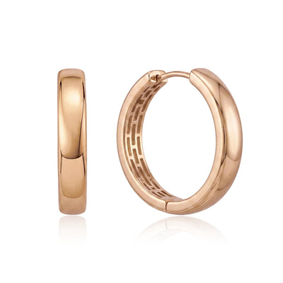 14K rose gold huggie hoop earrings, front and side view of the pair on white