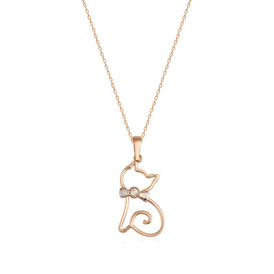 14K gold cat pendant necklace with cubic zirconia accent and bow on a delicate chain