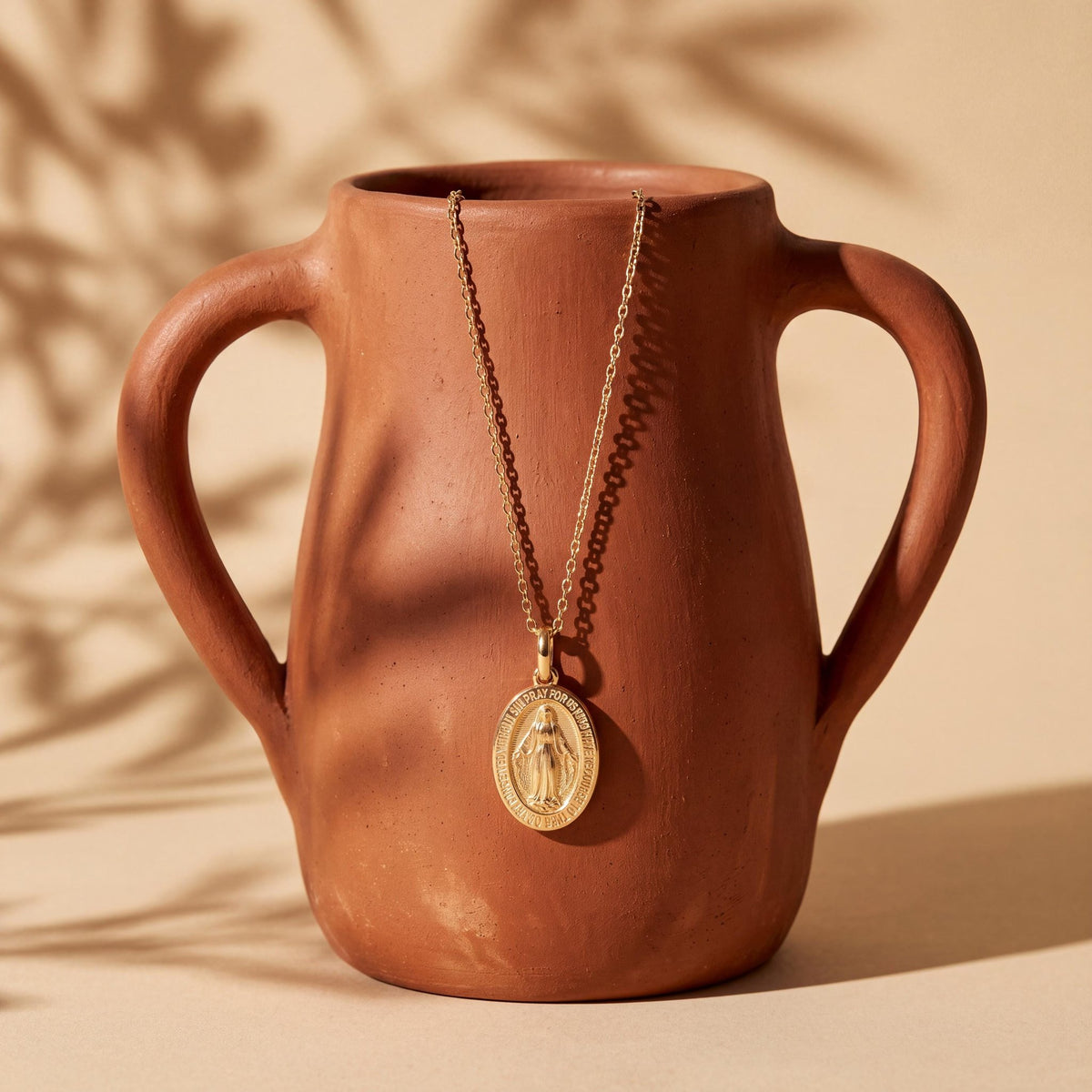 14K gold miraculous medal necklace, styled view