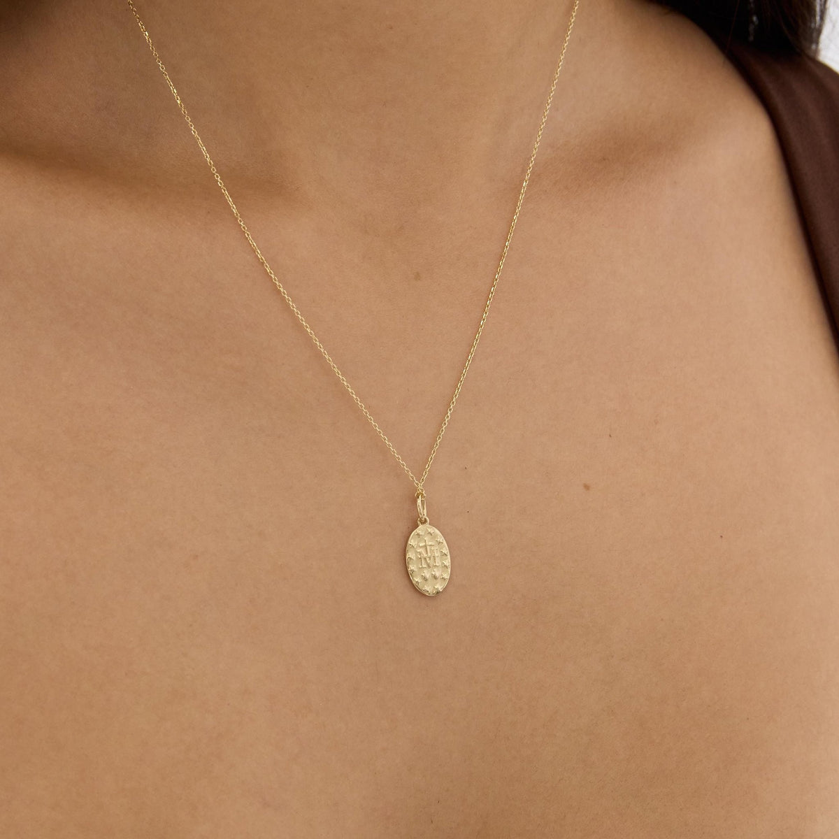 14K gold miraculous medal necklace, styled view