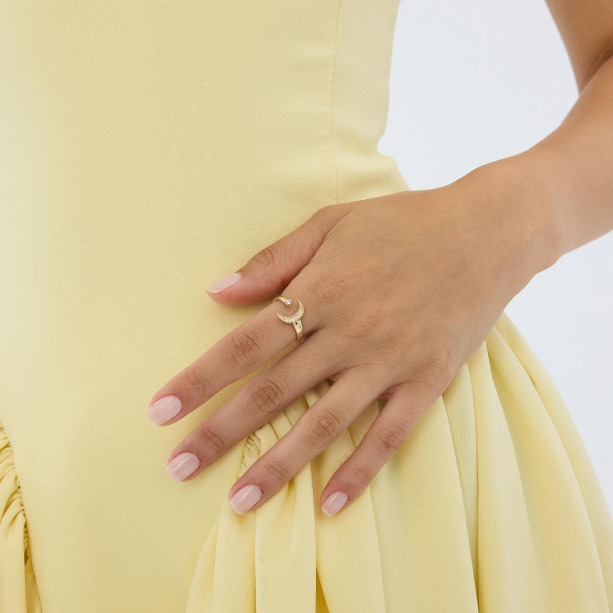 14K gold moon and star ring, styled view