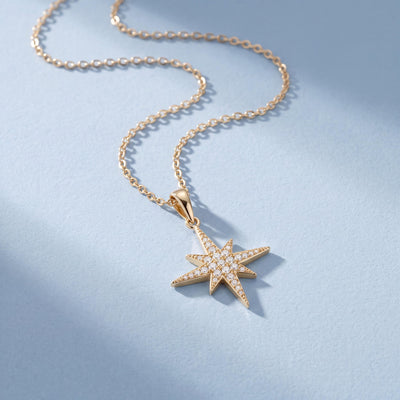 14K gold north star necklace, styled view