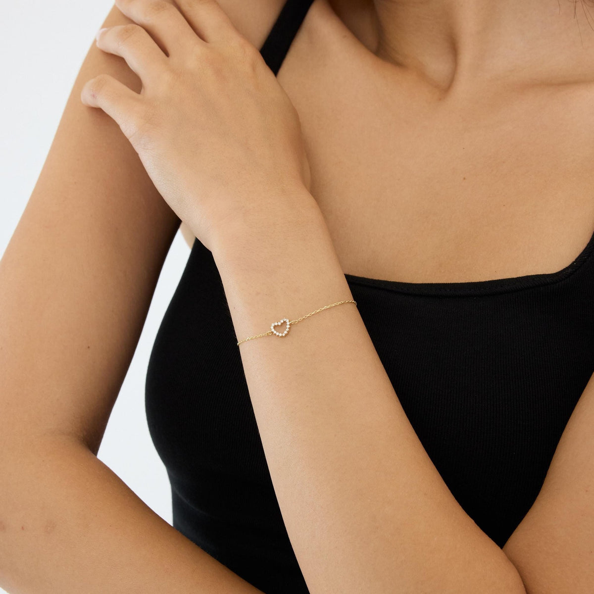 14K gold open heart bracelet, styled view