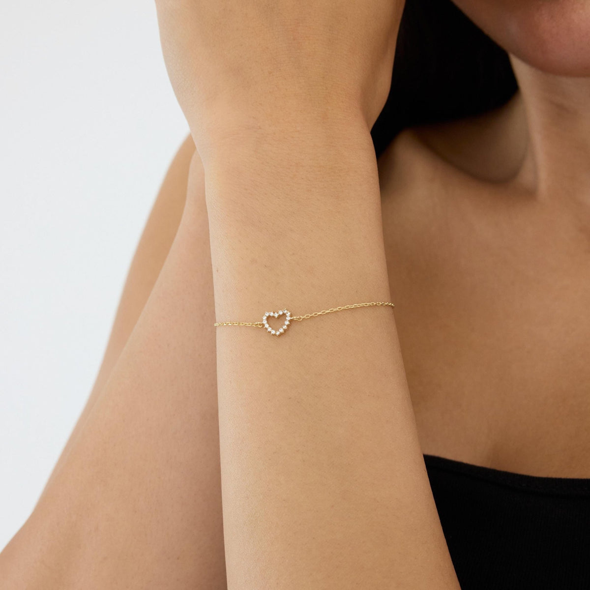 14K gold open heart bracelet, styled view