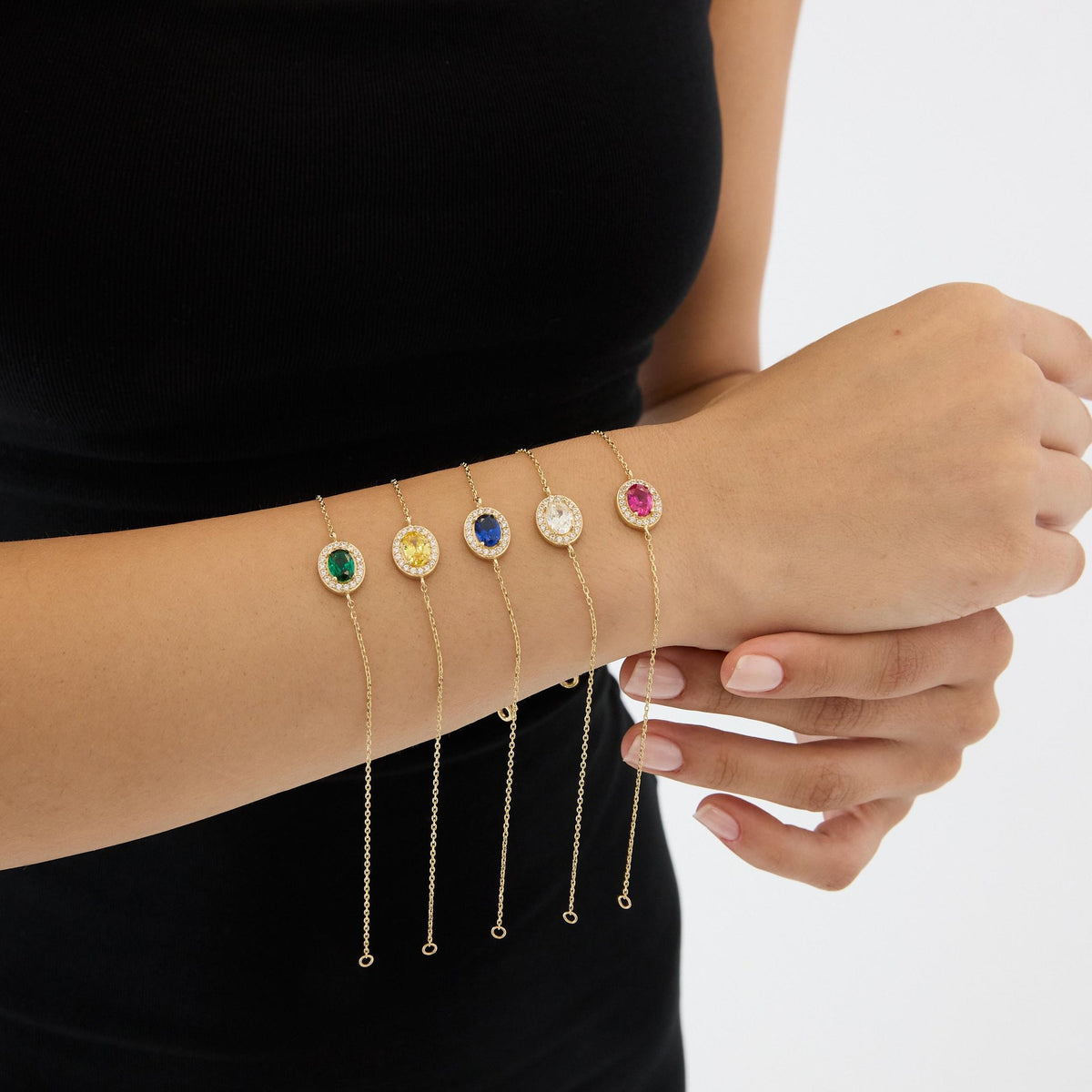 14K gold oval birthstone bracelet, styled view