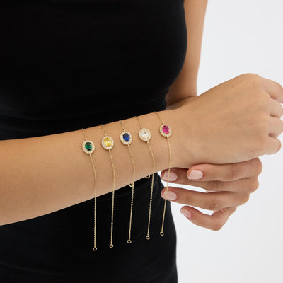 14K gold oval birthstone bracelet, styled view
