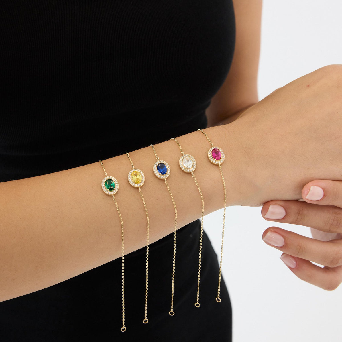 14K gold oval birthstone bracelet, styled view