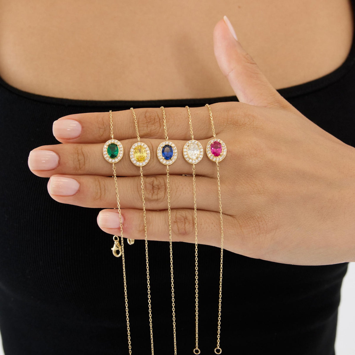 14K gold oval birthstone bracelet, styled view