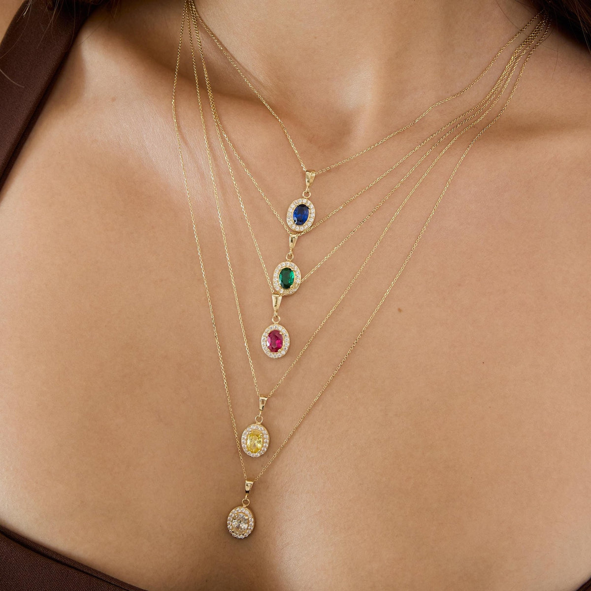14K gold oval halo pendant necklace, styled view