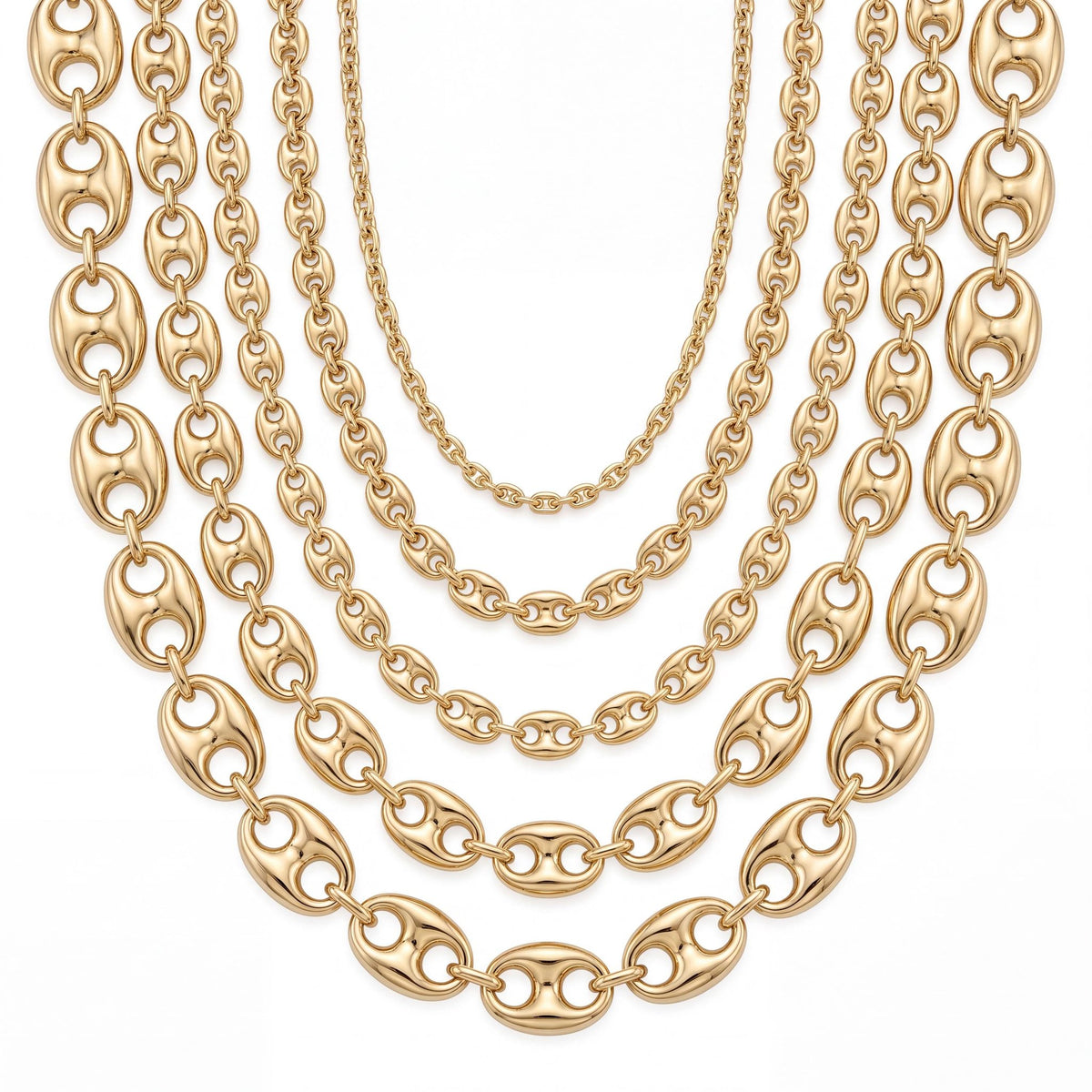 14K yellow gold puffed mariner chain necklace, five graduated chain widths laid flat on a white background