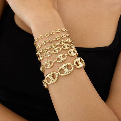 14K gold puffed mariner link bracelet, styled view