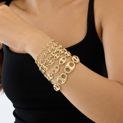 14K gold puffed mariner link bracelet, styled view