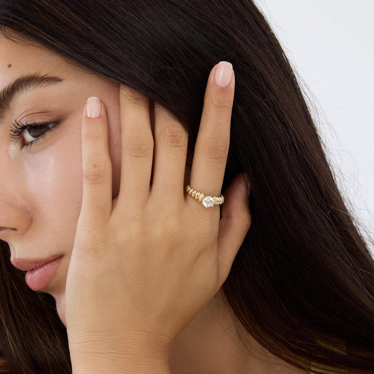 14K gold ribbed band ring, styled view