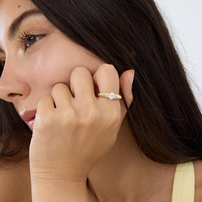 14K gold ribbed band ring, styled view