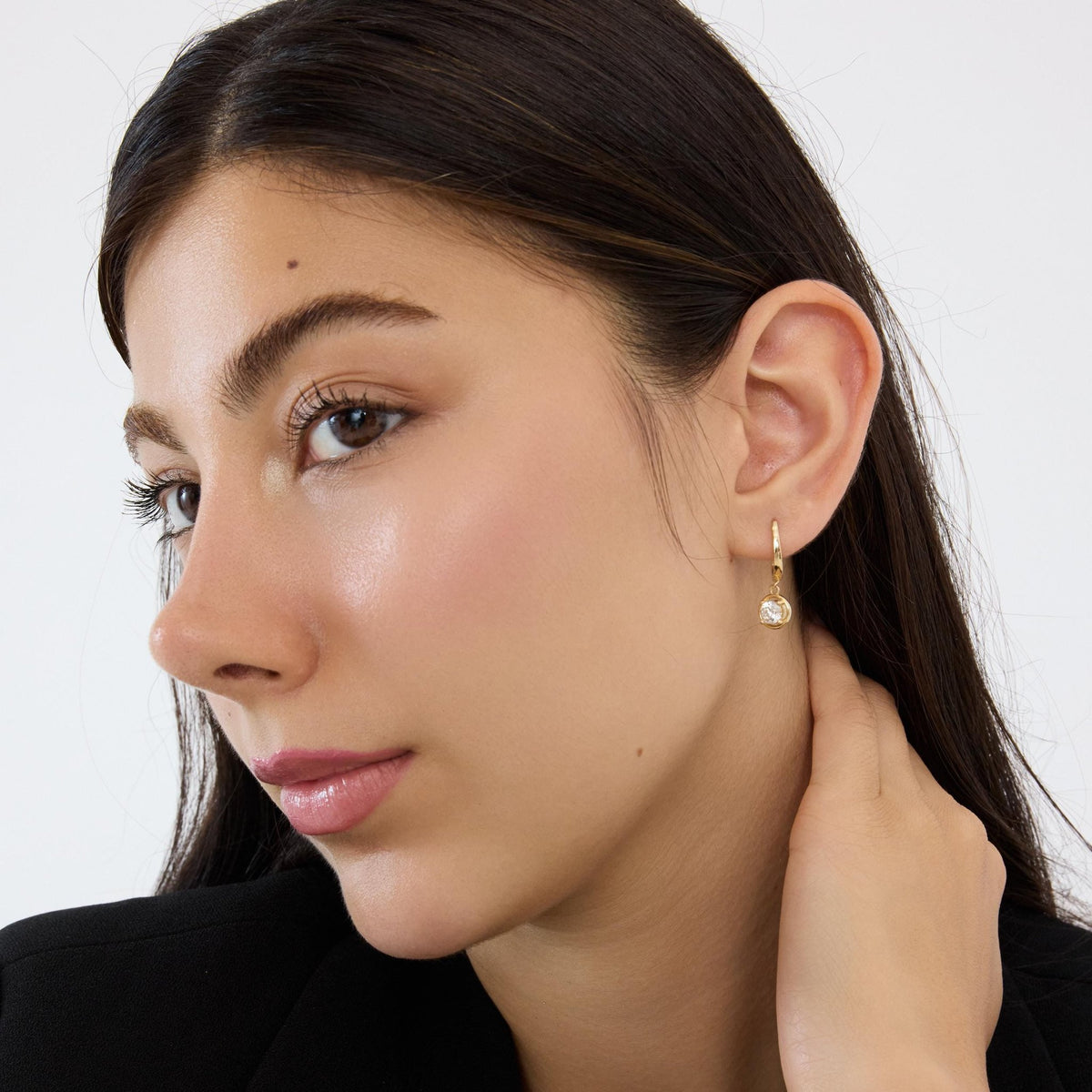 14K gold round cz solitaire drop hoop earrings, styled view