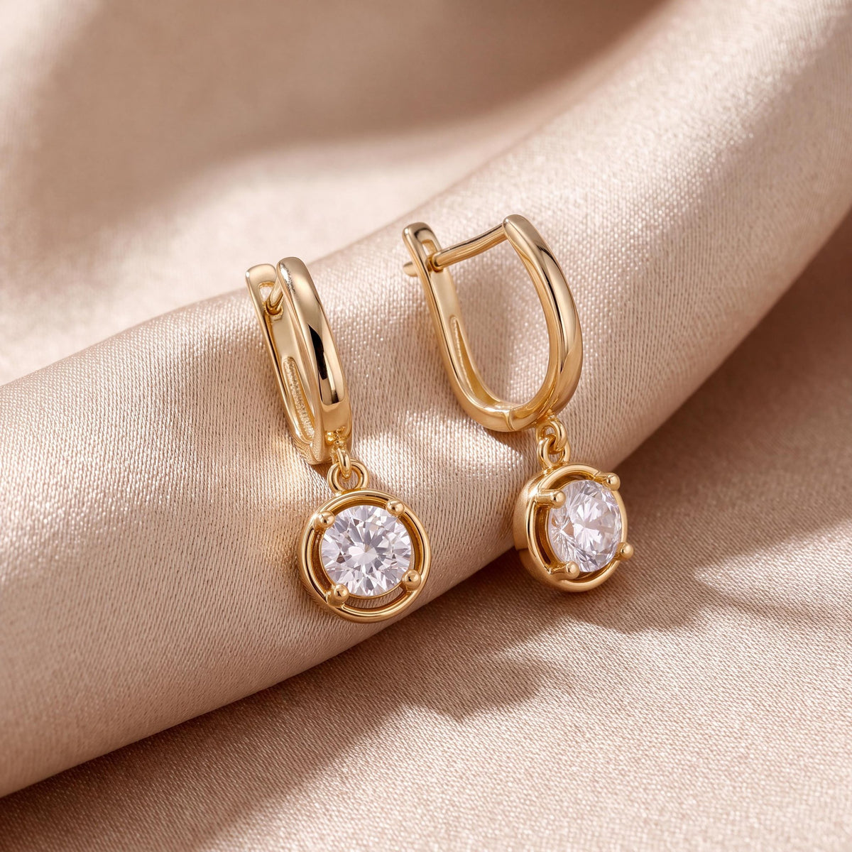 14K gold round cz solitaire drop hoop earrings, styled view