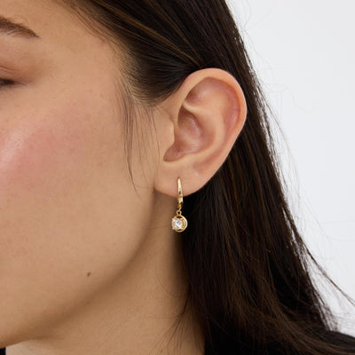 14K gold round cz solitaire drop hoop earrings, styled view