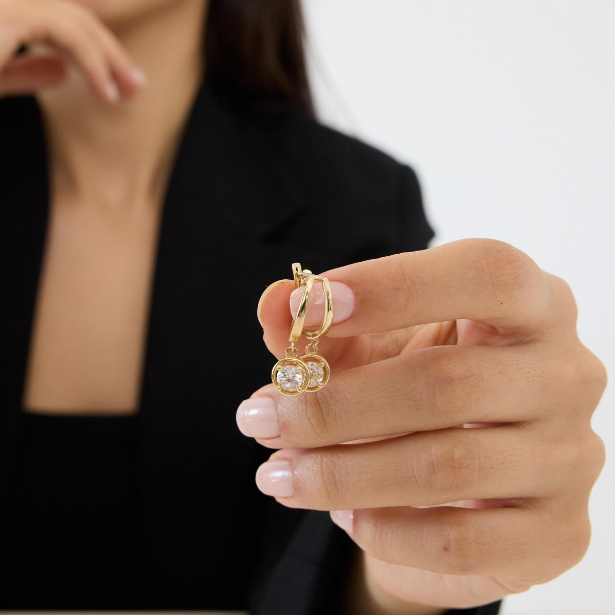 14K gold round cz solitaire drop hoop earrings, styled view