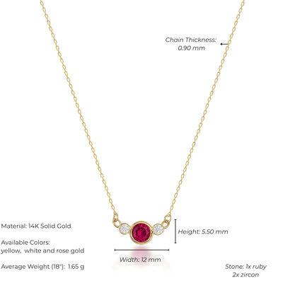 Gold necklace with a ruby and zircon stone on a white background