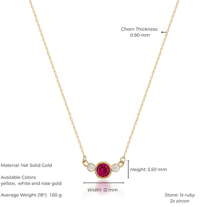 Gold necklace with a ruby and zircon stone on a white background