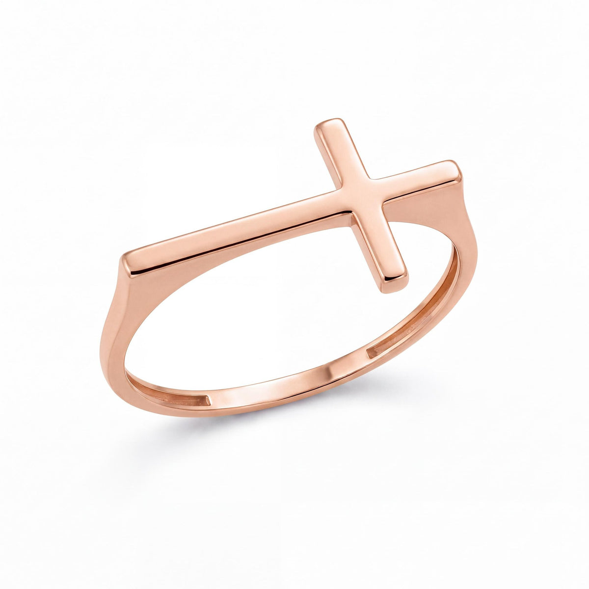 14K rose gold sideways cross ring flat lay on plain white background