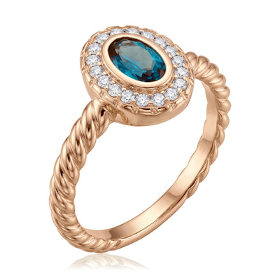 14K rose gold simulated turquoise ring, oval teal stone in a clear stone halo on a twisted rope band, on white
