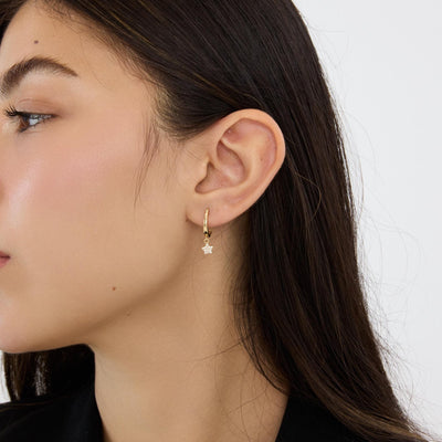 14K gold star hoop earrings, styled view